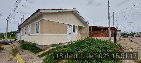 Casa, 57,18 m2 de área privativa, 71,25m2 de área.
