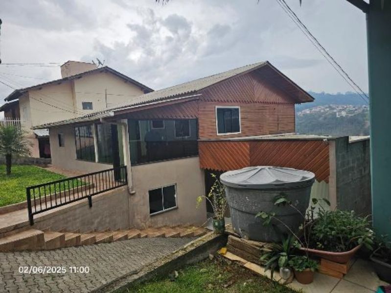 Terreno com casa em seara/sc.