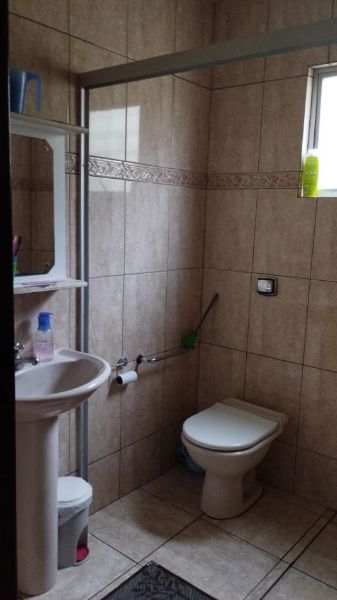 Terreno com Casa, Bairro Pinheirinho, localizado em Curitiba - PR