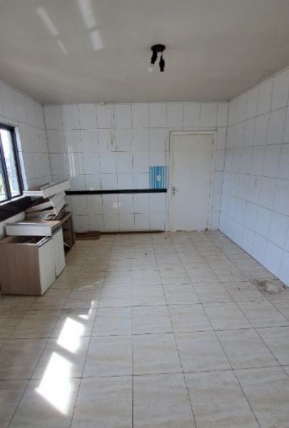 Terreno com casa (desocupada), localizado em Pinhalzinho - SC