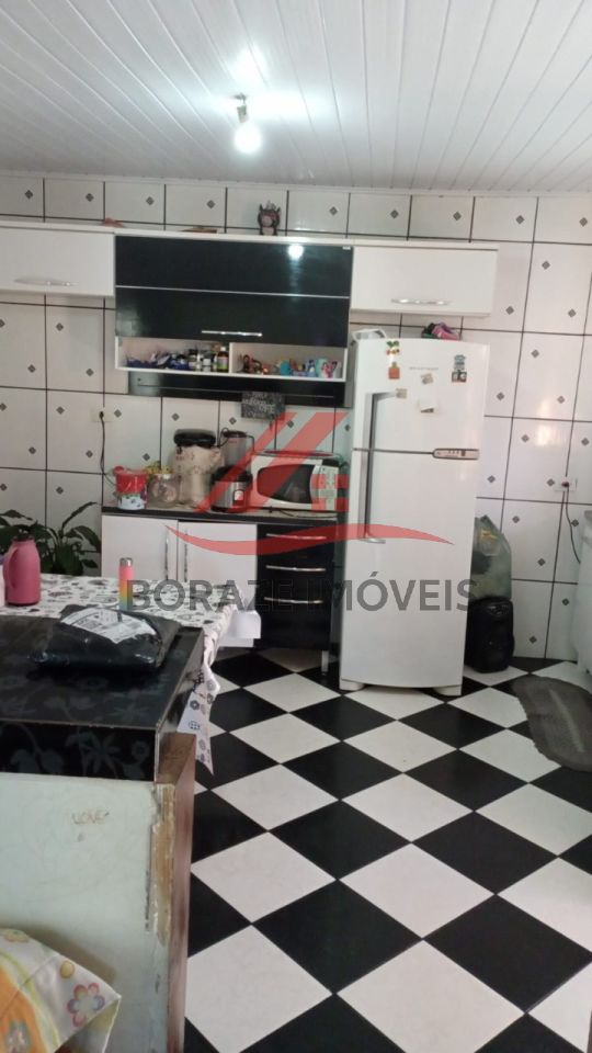 Terreno com 5 casas no terreno para venda no Jardim Itapeva em Mauá
