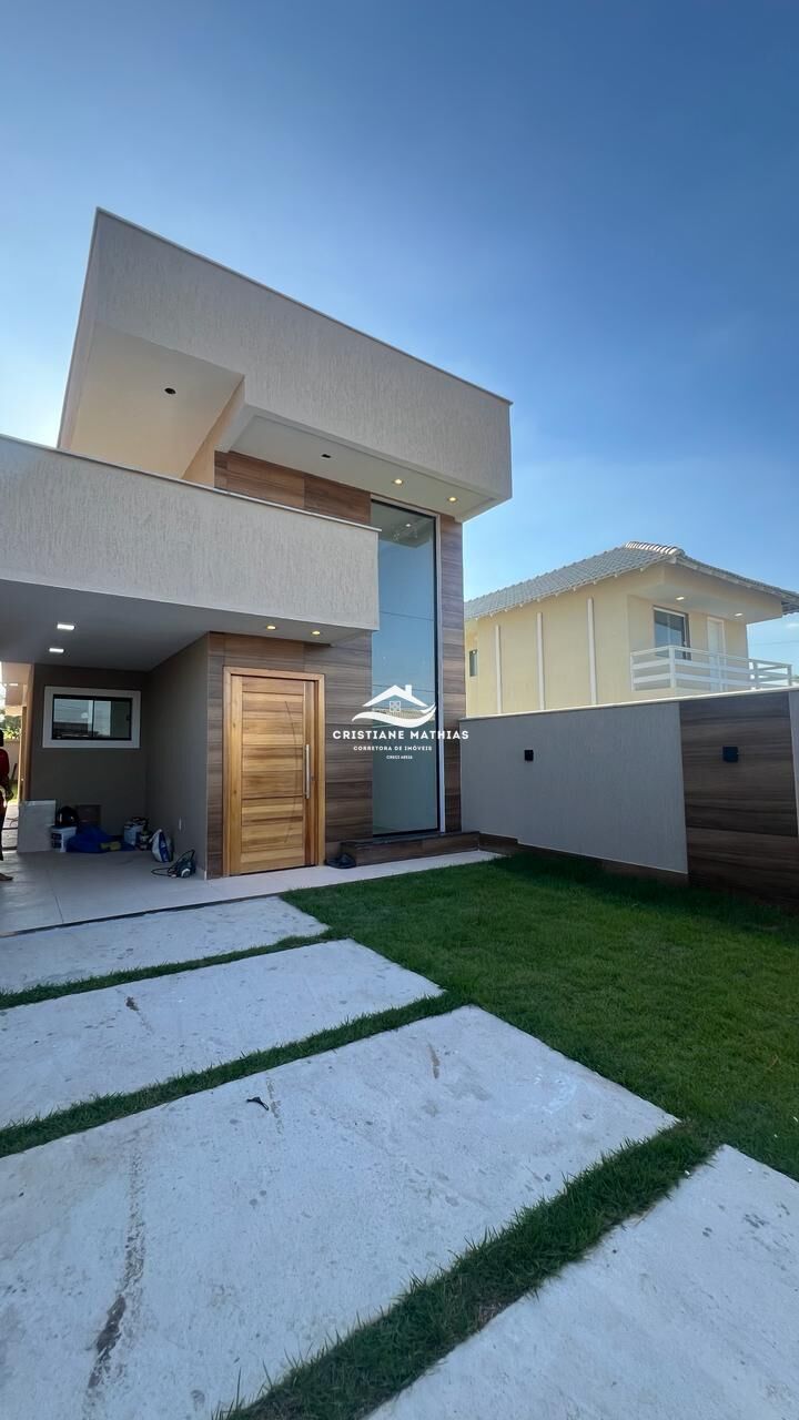 Casa à venda com 3 quartos, 100m² - Foto 1