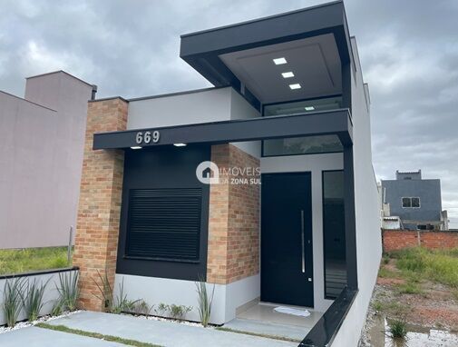 Casa à venda com 3 quartos, 100m² - Foto 2