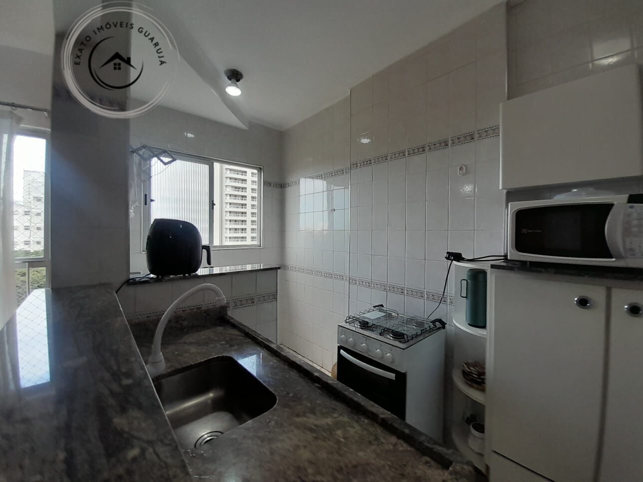 Apartamento padrão para locação anual na praia da enseada, g