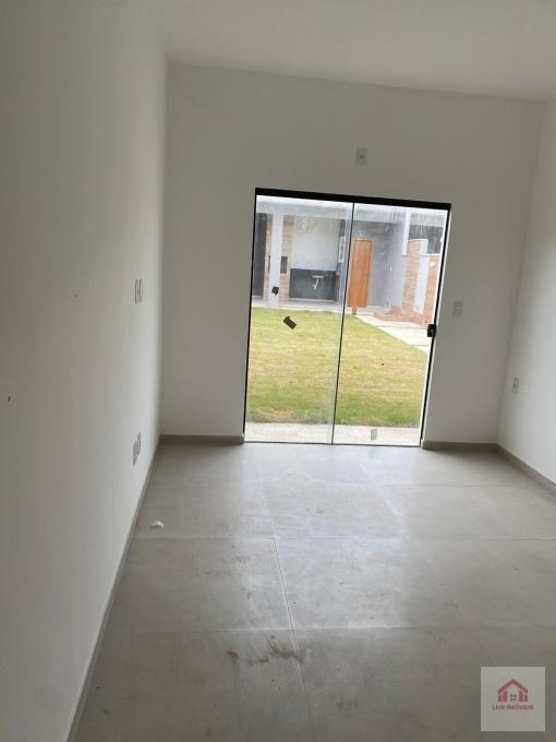 Casa à venda com 3 quartos, 100m² - Foto 4