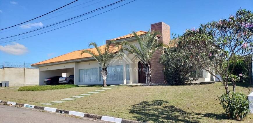 Casa à venda com 5 quartos, 311m² - Foto 1