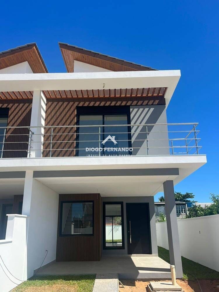 Casa à venda com 3 quartos, 157m² - Foto 1