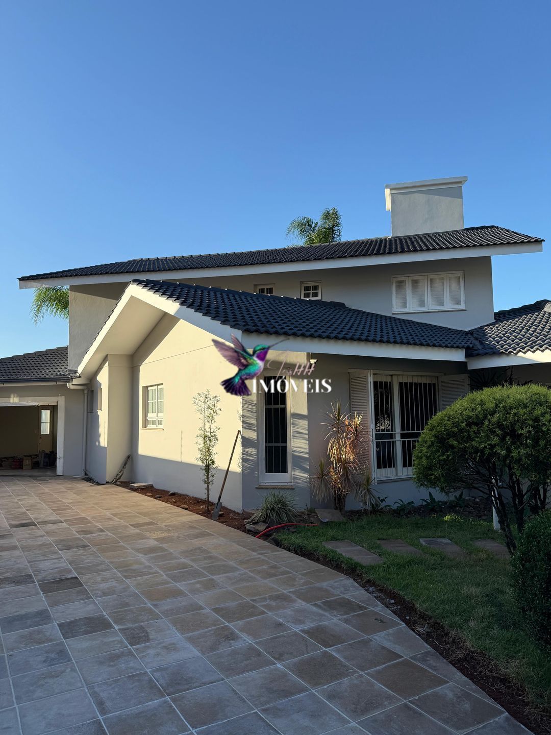 Casa à venda com 4 quartos, 319m² - Foto 1