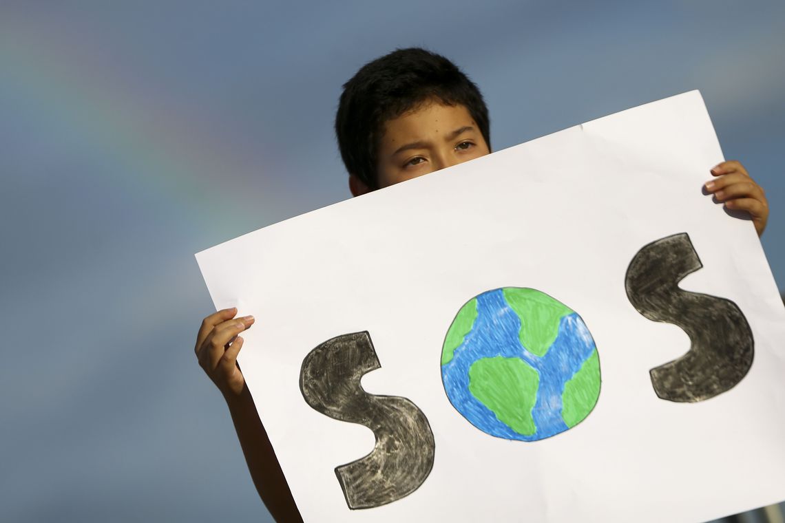 Durante de ato realizado por estudantes em Brasília para sensibilizar o governo contra o aquecimento global