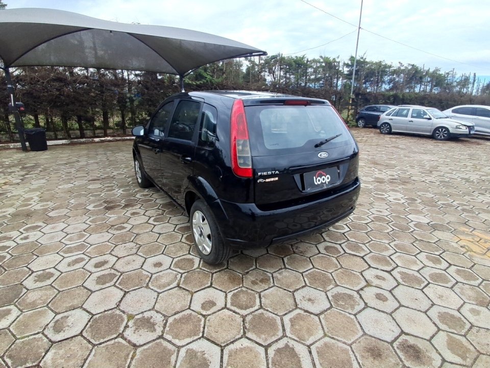 FORD FIESTA 1.0 ROCAM HATCH 8V FLEX 4P MANUAL 2013/2013 — foto do lote