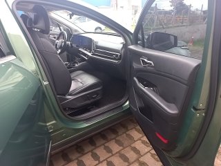 KIA SPORTAGE TMHEV EXP Porta e interior passageiro