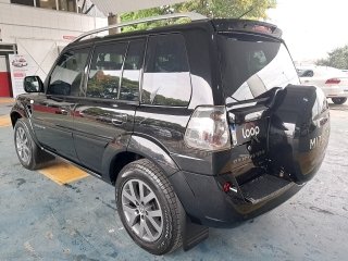 MITSUBISHI PAJERO TR4 2.0 4X2 16V 140CV FLEX 4P AUTOMÁTICO Traseira Motorista