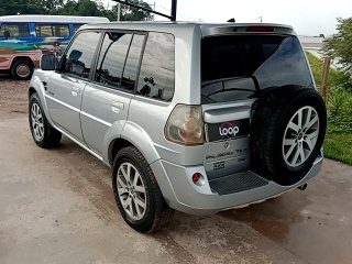 MMC PAJERO TR4 FLEX HP Traseira Motorista