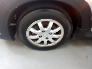 PEUGEOT 207 ESCAPADE Pneu dianteiro esq.